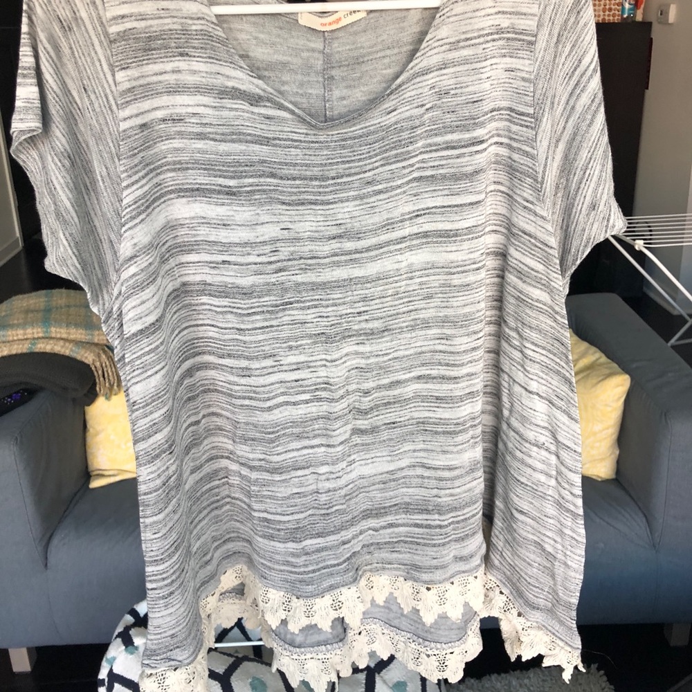 Grey shirt with lace trimmings